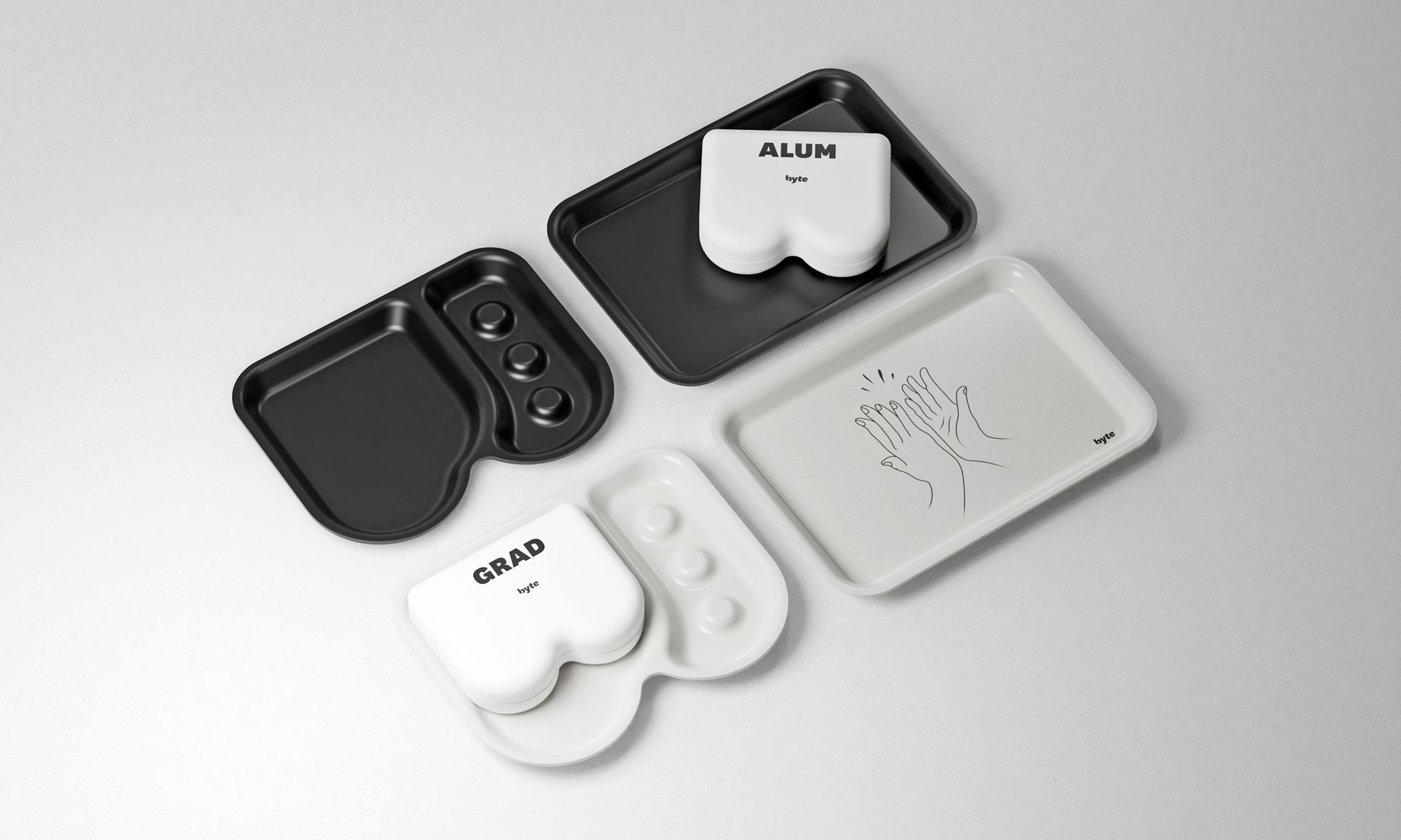 Spread flat lay of byte foil packs and bottles with tongue scraper